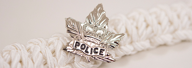 Silver 3 point leaf pin. Police in blue.
