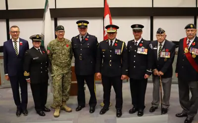 First Poppy Pinning Ceremony - group photo, wearing poppies