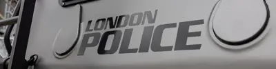 Emergency Response Unit Vehicle, close up of door, grey with dark grey lettering "London Police"