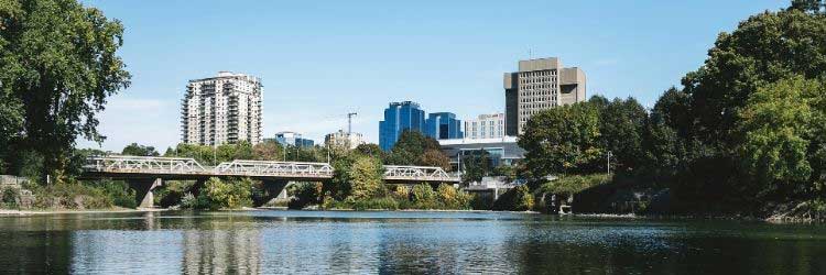 City of London ON, skyscrapers, bridge overlooking Thames River