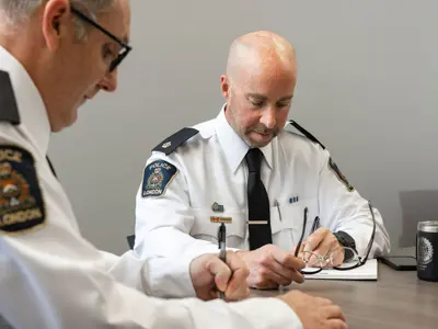 LPS executive members reviewing forms